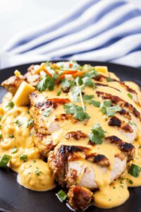 Mexican Chicken with Creamy Cheddar Cheese Sauce Recipe